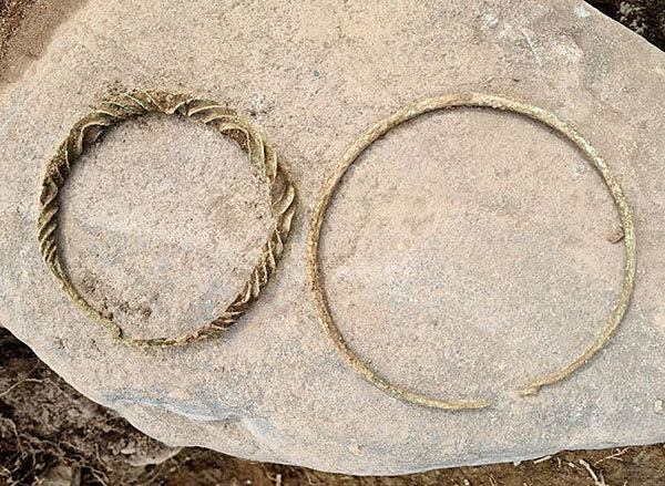 Twisted Bronze Neck Rings Unearthed From 2,500-Year-Old Swedish Grave